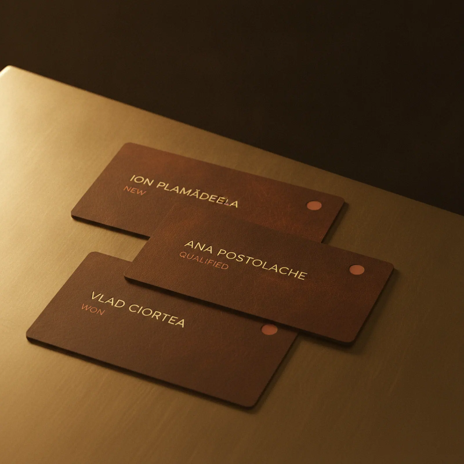 CRM & pipeline — a row of leather-and-brass deal cards